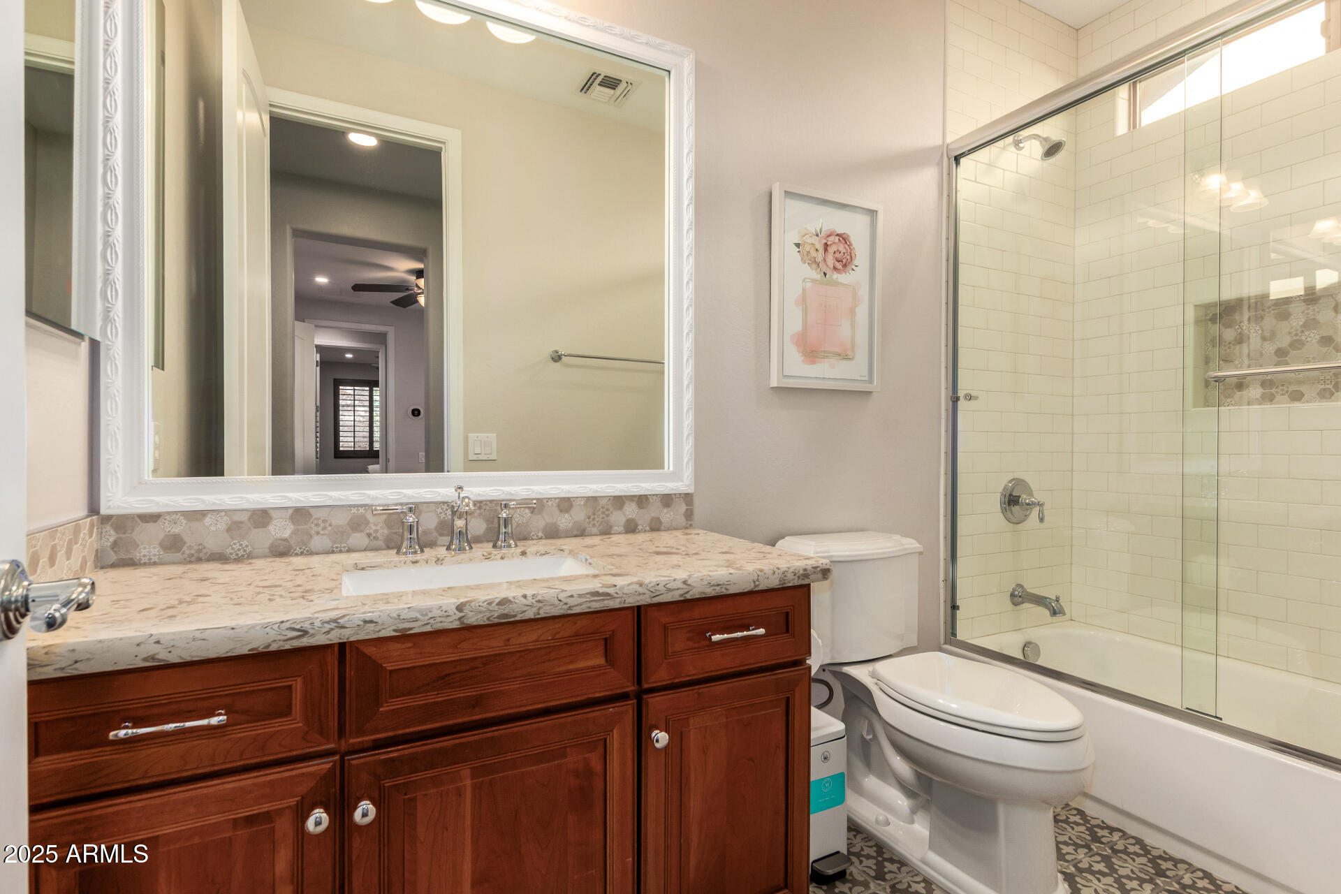 21626 North 38th Way Phoenix, AZ 85050 - Photo 31 of 72 a bathroom with a granite countertop toilet sink and a mirror