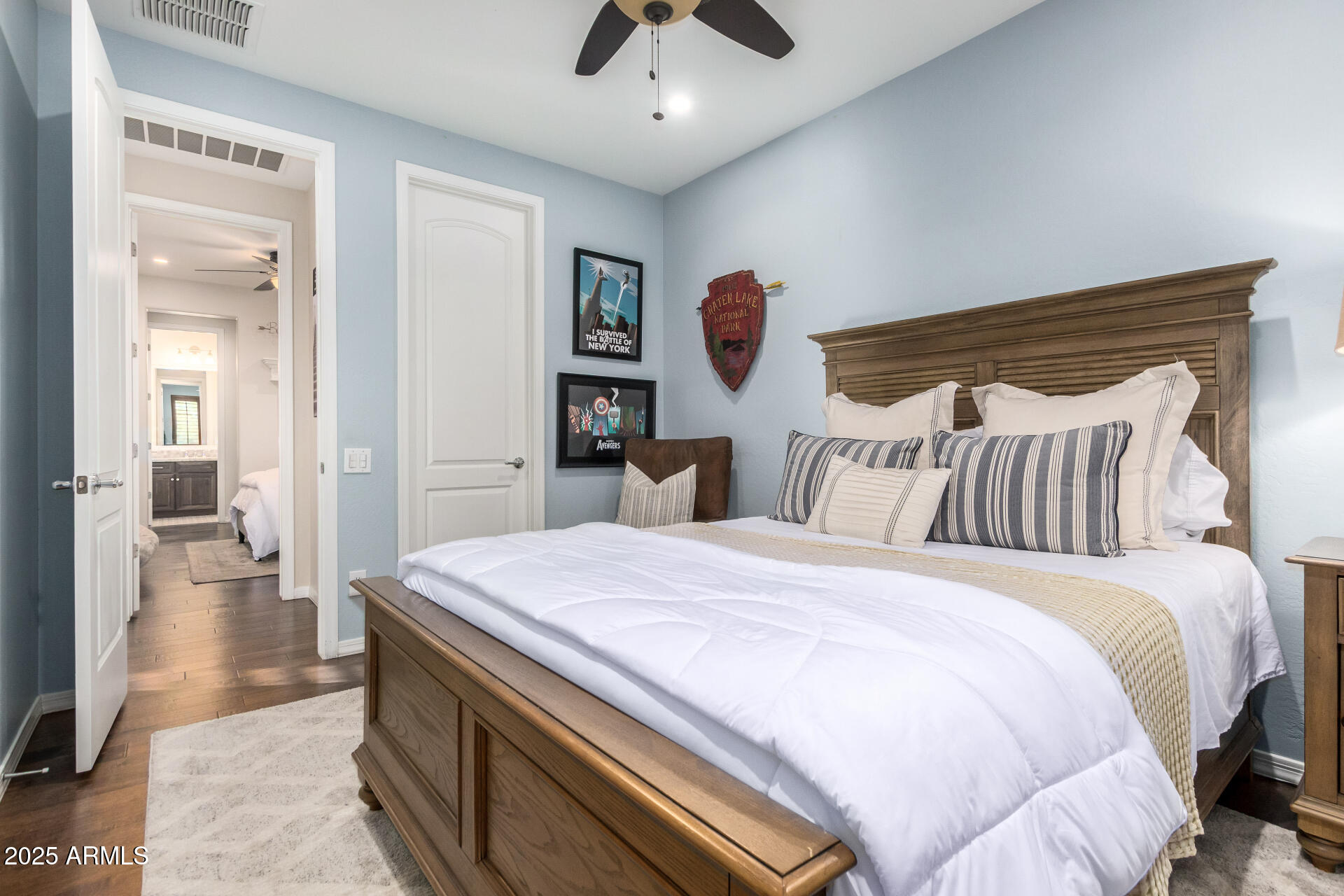 21626 North 38th Way Phoenix, AZ 85050 - Photo 33 of 72 a bedroom with a bed and a chandelier