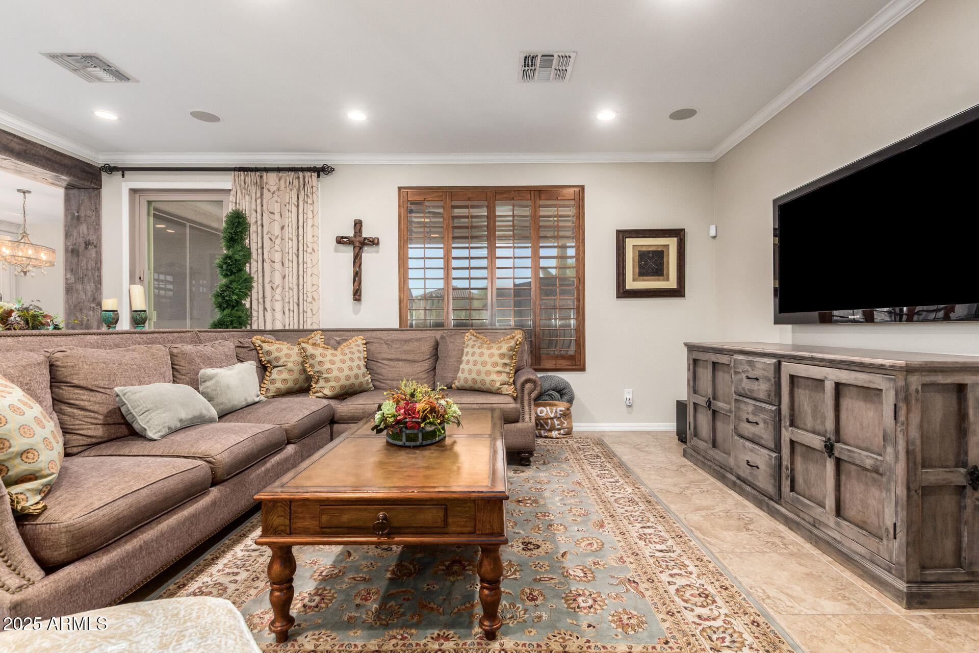 21626 North 38th Way Phoenix, AZ 85050 - Photo 6 of 72 a living room with furniture and a flat screen tv