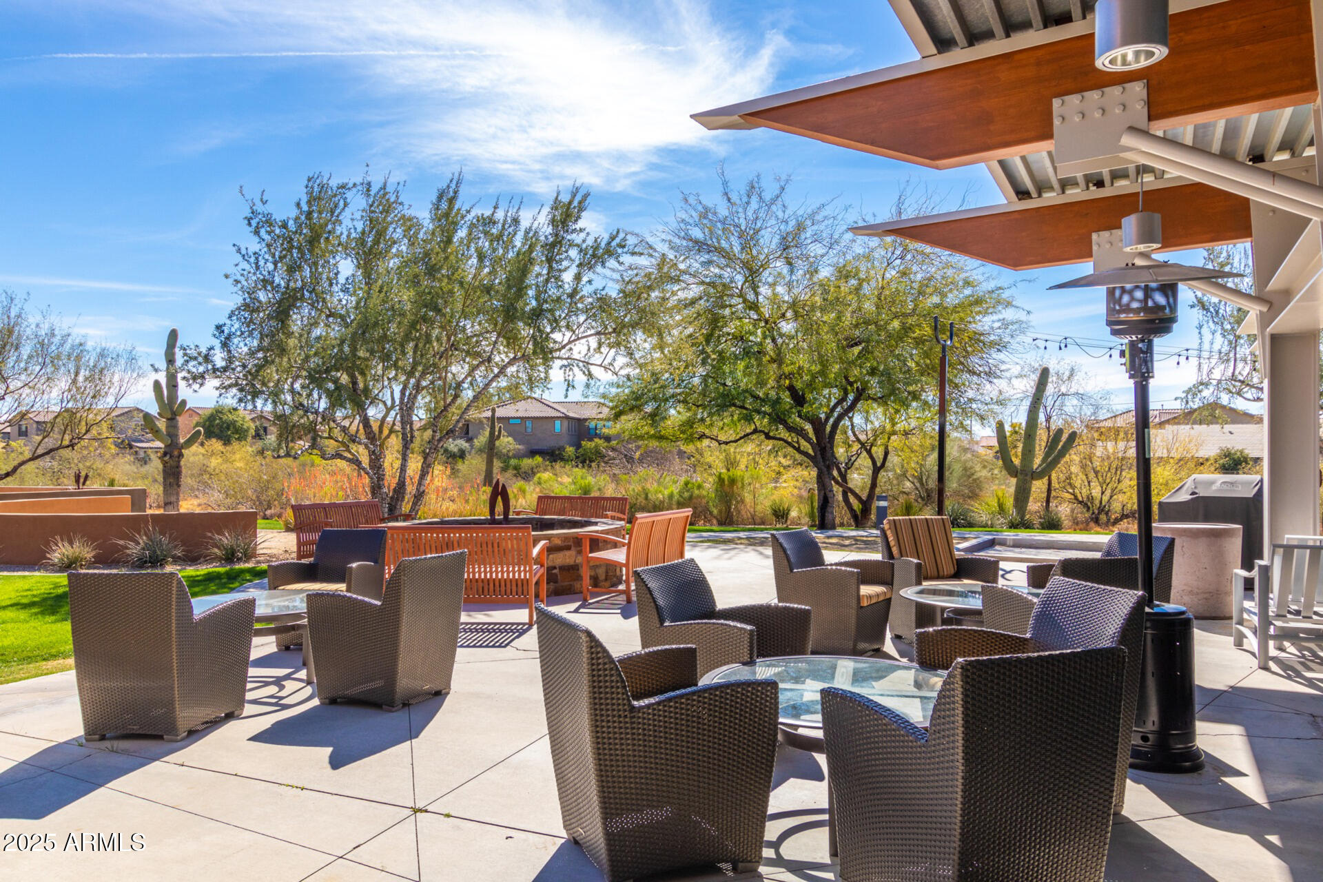 21626 North 38th Way Phoenix, AZ 85050 - Photo 61 of 72 a view of a tables and chairs under an umbrella