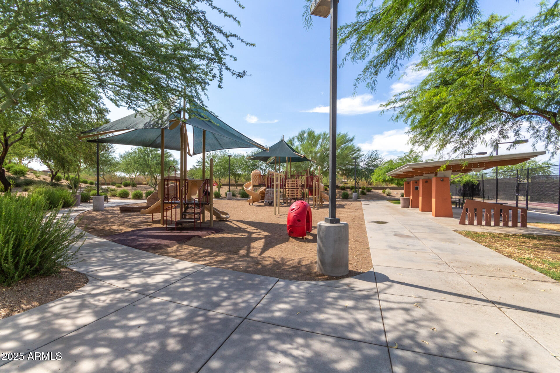 21626 North 38th Way Phoenix, AZ 85050 - Photo 63 of 72 a view of outdoor space yard deck patio and fire pit