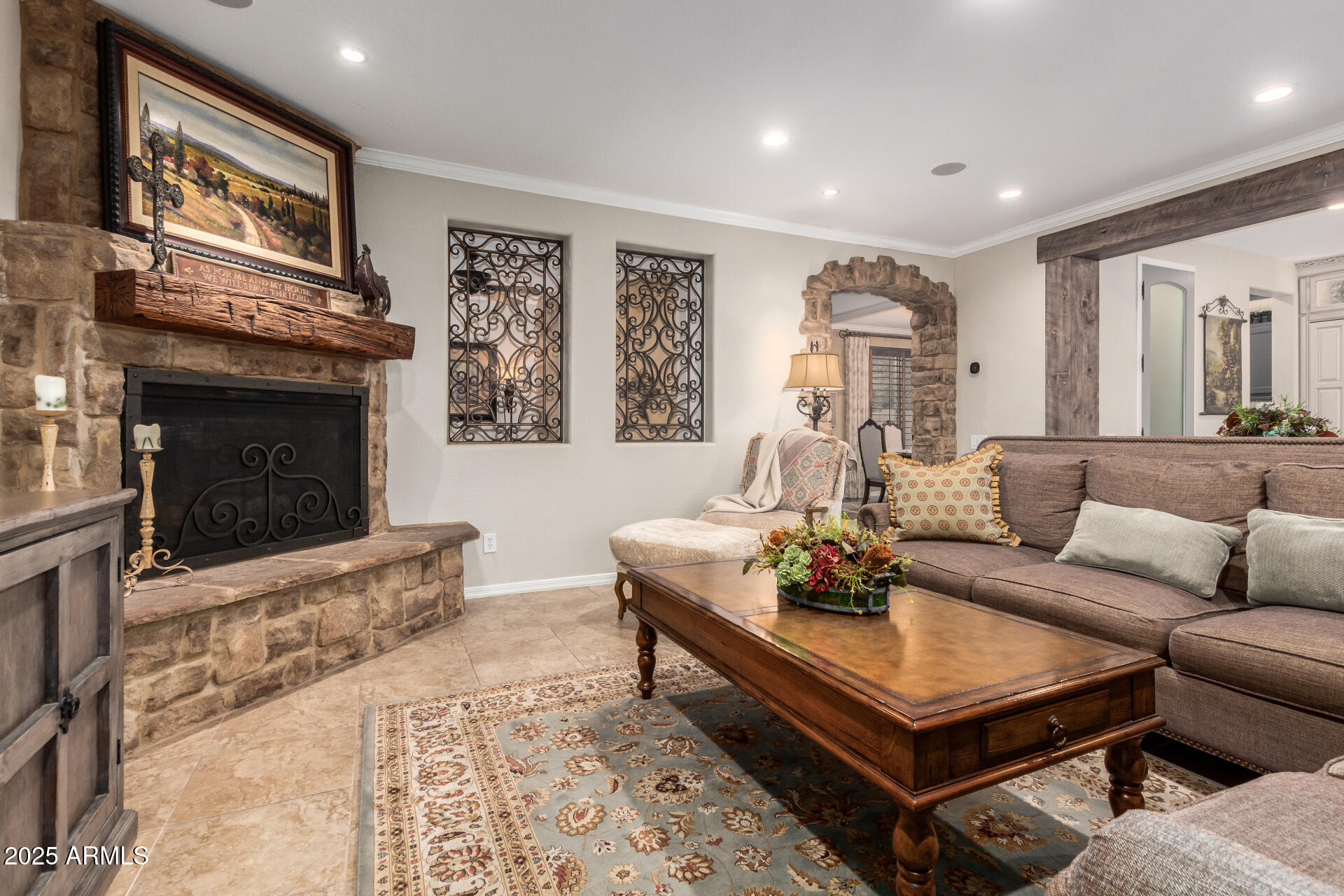 21626 North 38th Way Phoenix, AZ 85050 - Photo 7 of 72 a living room with furniture and a fireplace