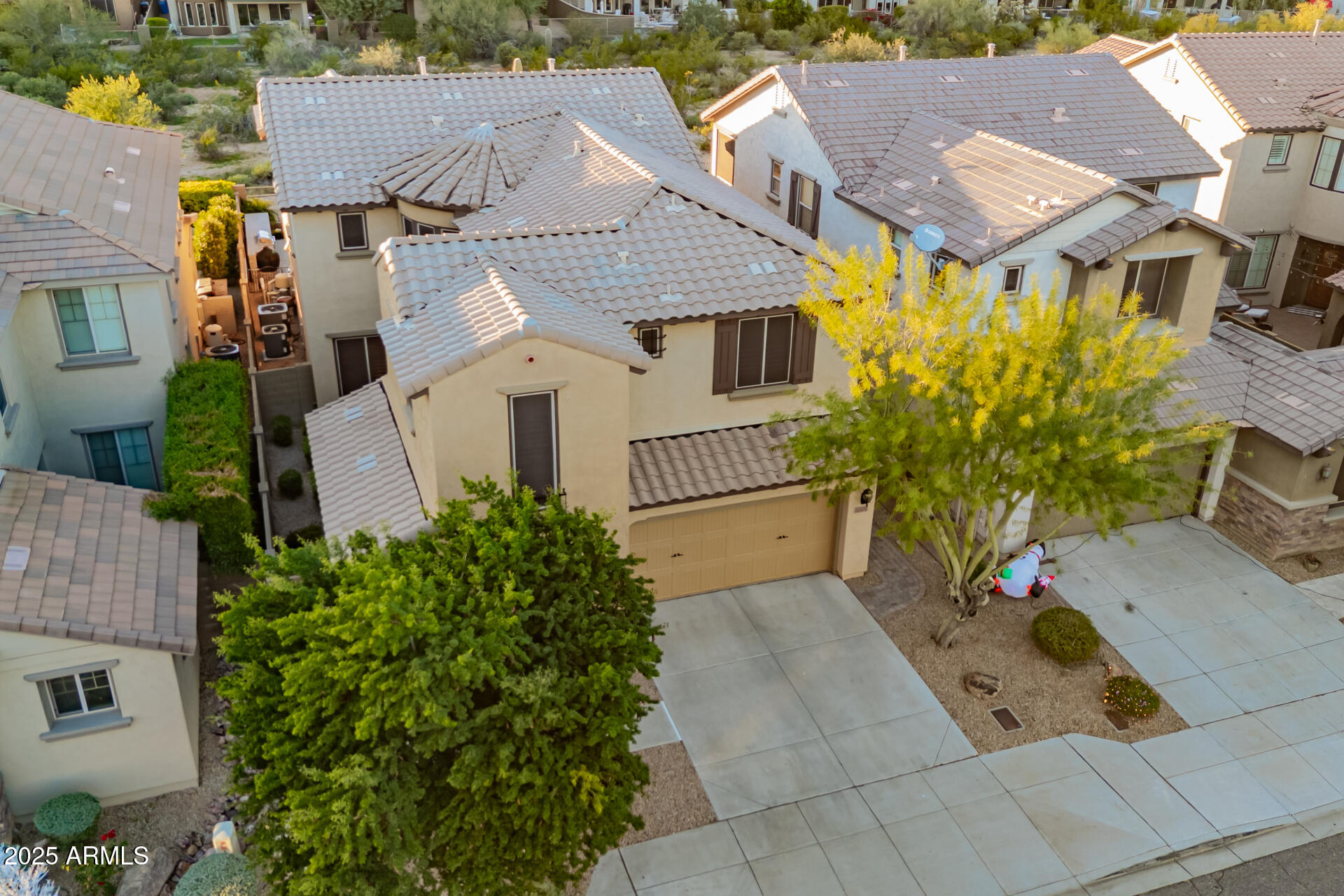 21626 North 38th Way Phoenix, AZ 85050 - Photo 71 of 72 an aerial view of a house with a yard and sitting area