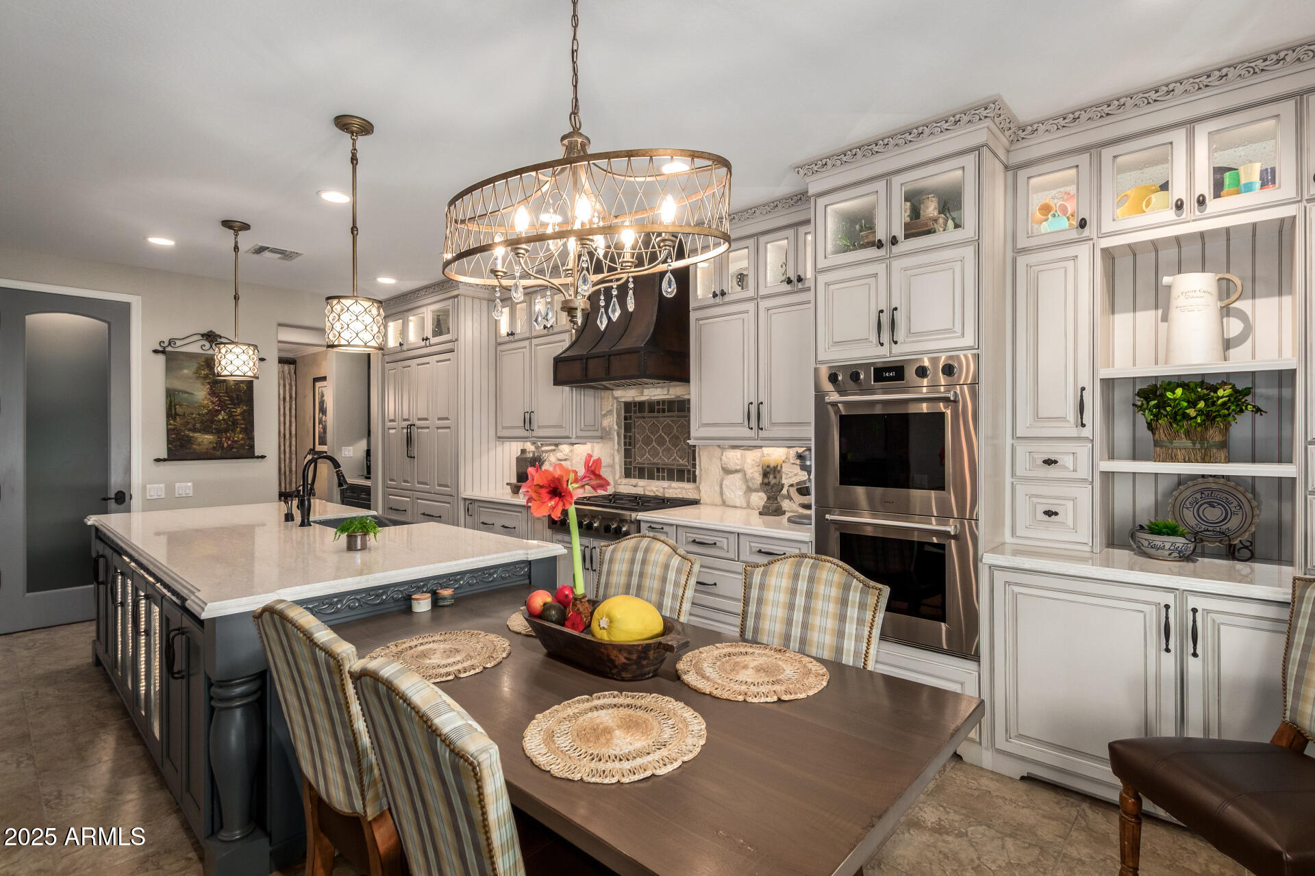 21626 North 38th Way Phoenix, AZ 85050 - Photo 10 of 72 a kitchen with sink refrigerator and dining table
