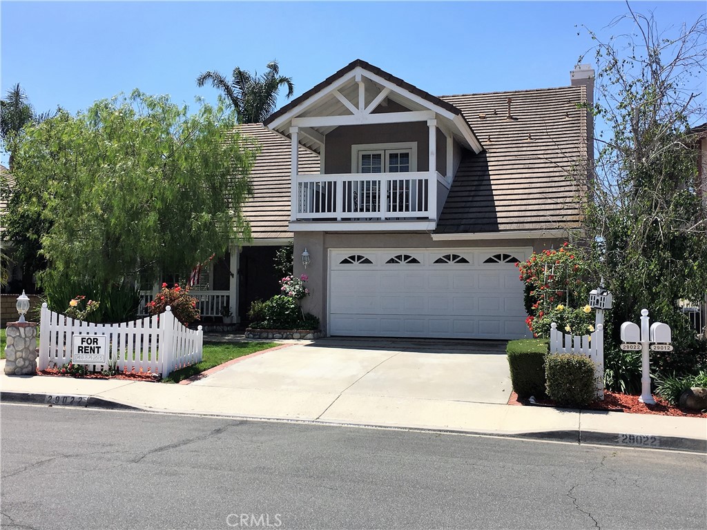 29022 Modjeska Peak Lane Lake Forest, CA 92679 - Photo 2 of 36 a front view of a house with a yard