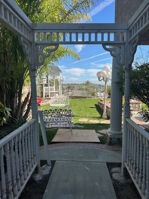 29022 Modjeska Peak Lane Lake Forest, CA 92679 - Photo 27 of 36 a view of a porch with a yard
