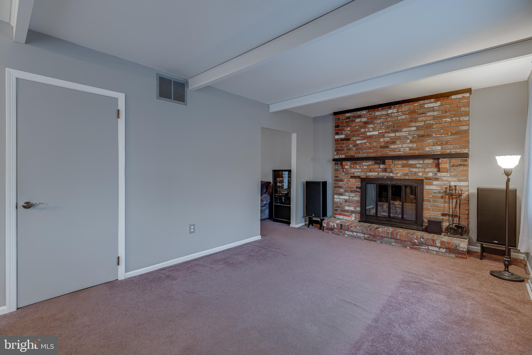 10963 Kipling Lane Philadelphia, PA 19154 - Photo 13 of 39 a view of a livingroom with an empty room and fire place