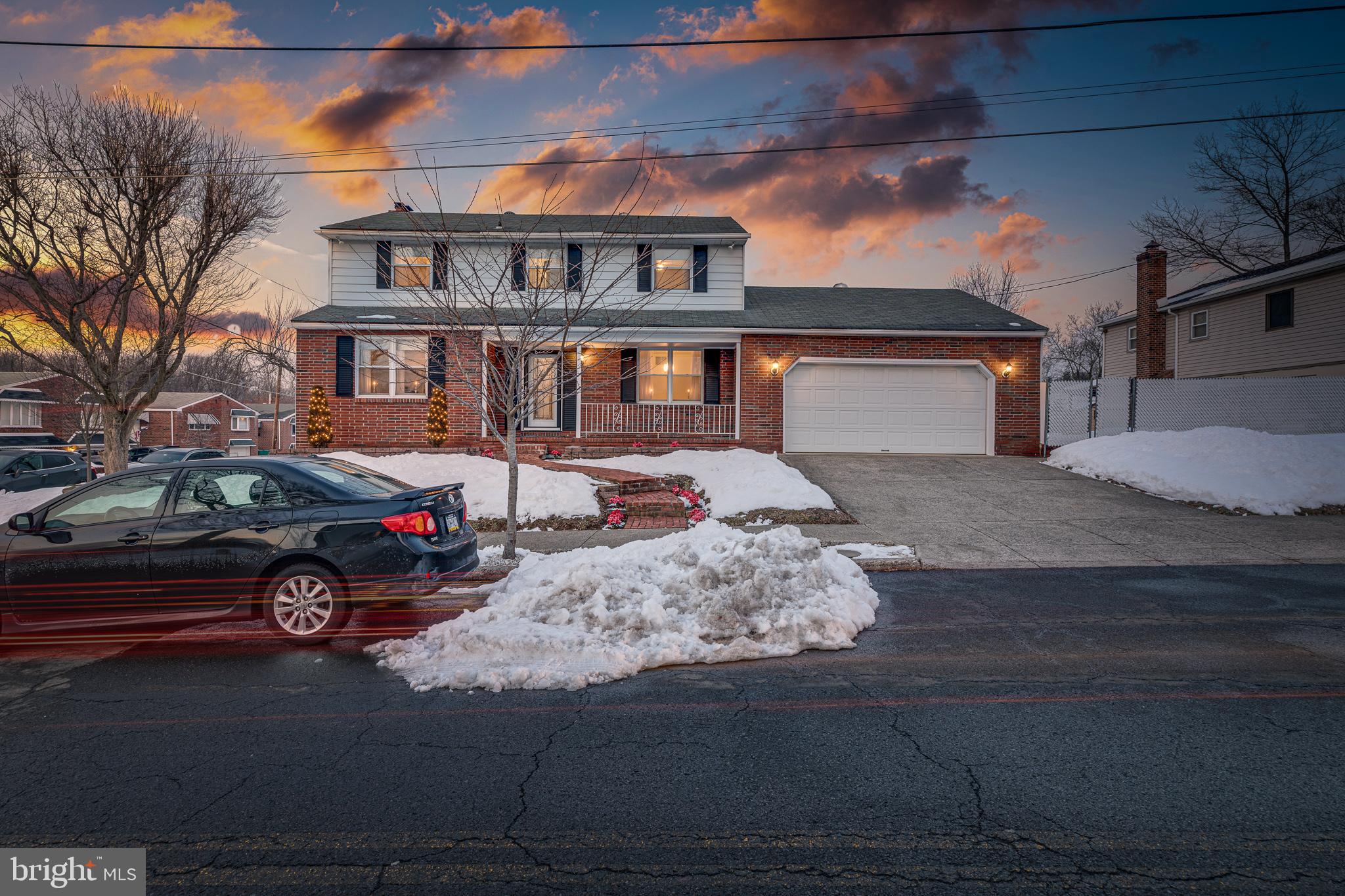 10963 Kipling Lane Philadelphia, PA 19154 - Photo 3 of 39 a front view of a house with a yard