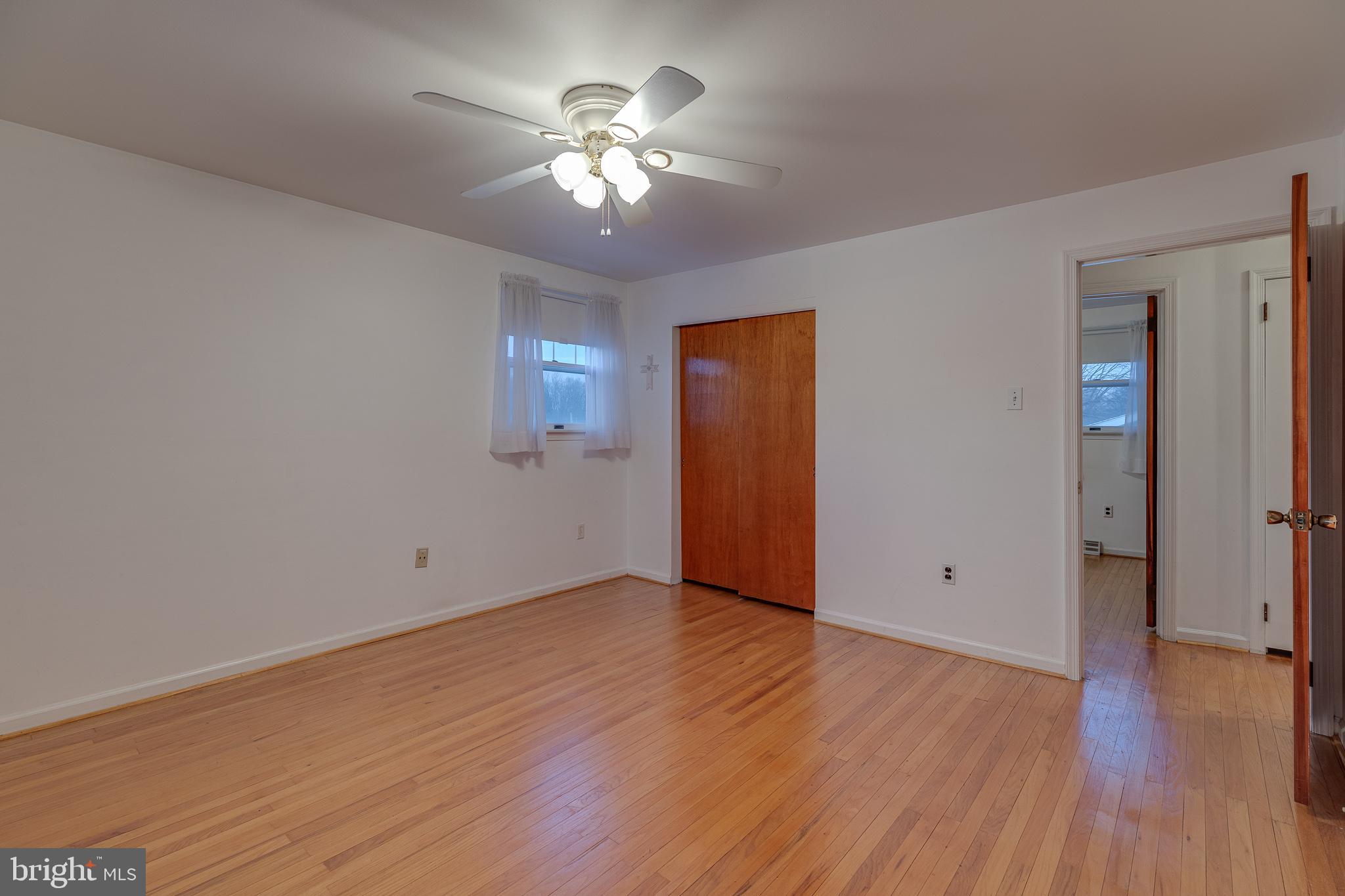10963 Kipling Lane Philadelphia, PA 19154 - Photo 27 of 39 a view of an empty room with wooden floor