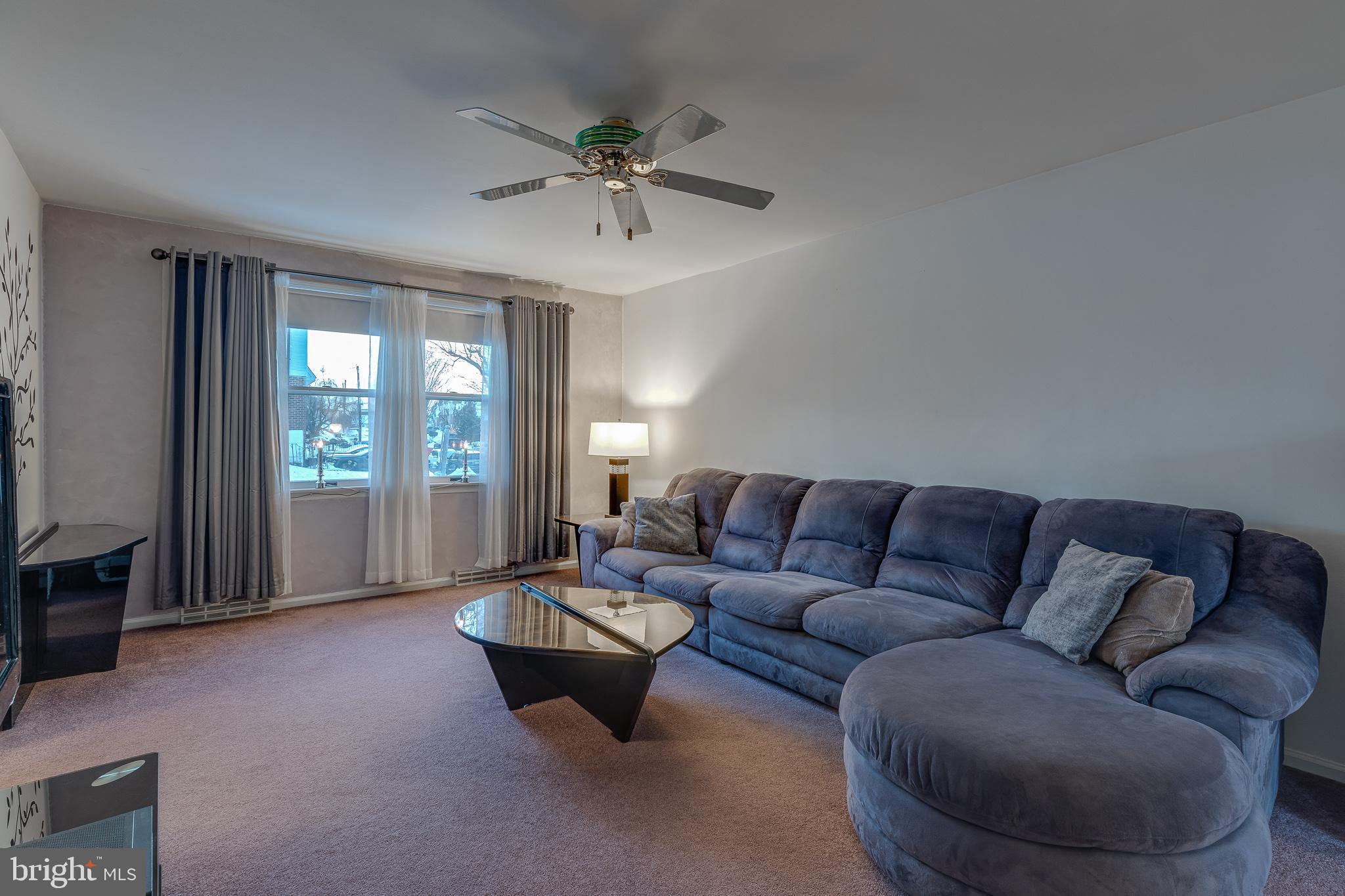 10963 Kipling Lane Philadelphia, PA 19154 - Photo 6 of 39 a living room with furniture and a large window