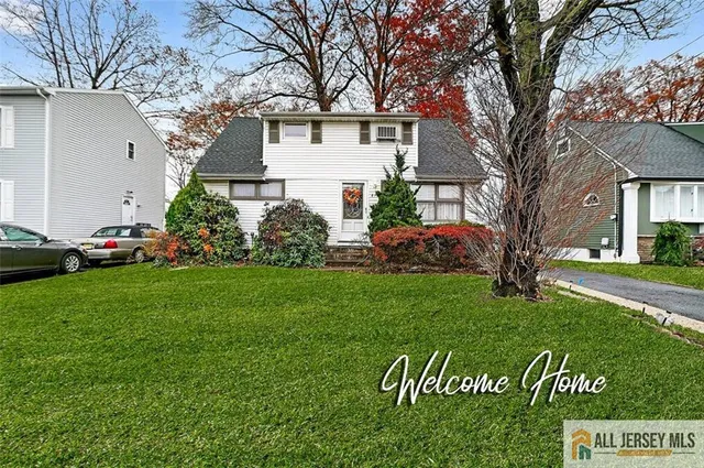 a front view of house with garden