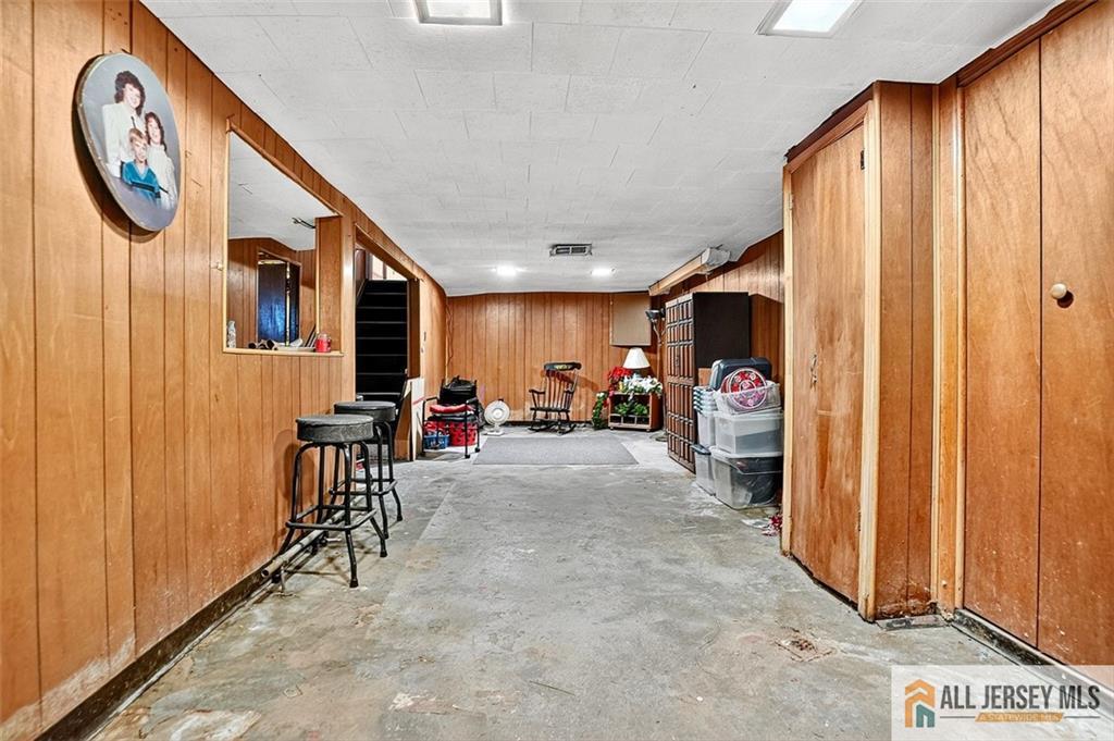 84 South Inman Avenue Avenel, NJ 07001 - Photo 22 of 27 a view of a hallway with elevator