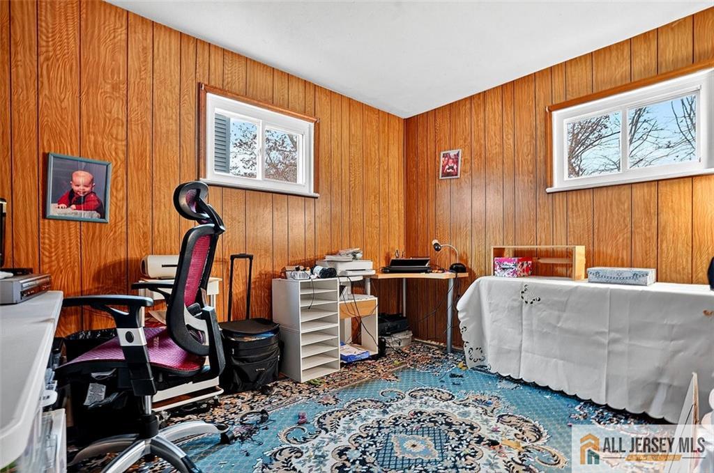 84 South Inman Avenue Avenel, NJ 07001 - Photo 7 of 27 a room with furniture and musical instruments