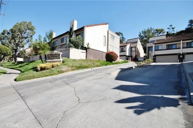 a view of a street with houses
