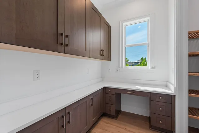 a kitchen with a sink and cabinets