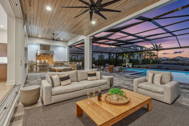 a living room with furniture and a table