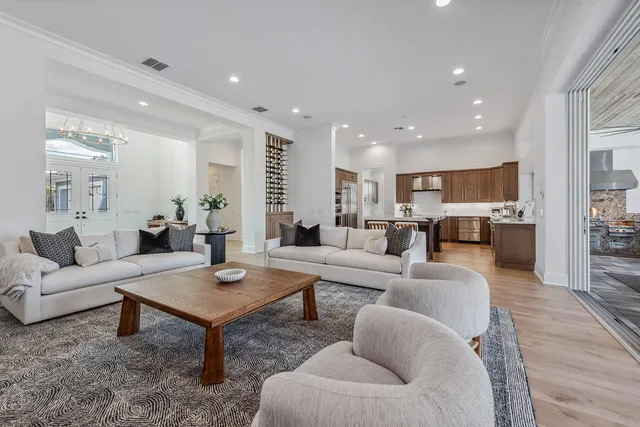 a living room with furniture and a table
