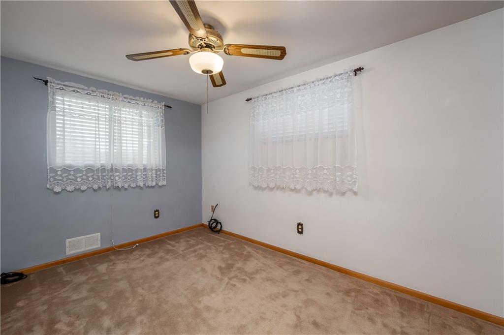 232 Pflugh Road Butler, PA 16001 - Photo 11 of 24 a view of an empty room with a window