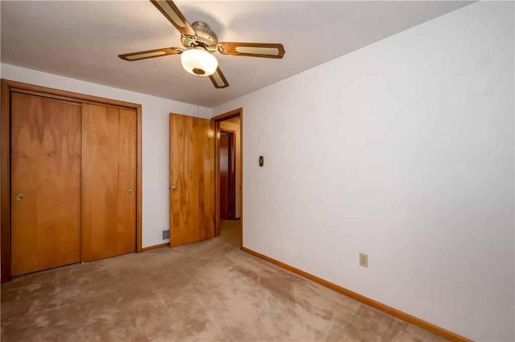 232 Pflugh Road Butler, PA 16001 - Photo 12 of 24 an empty room with windows and fan