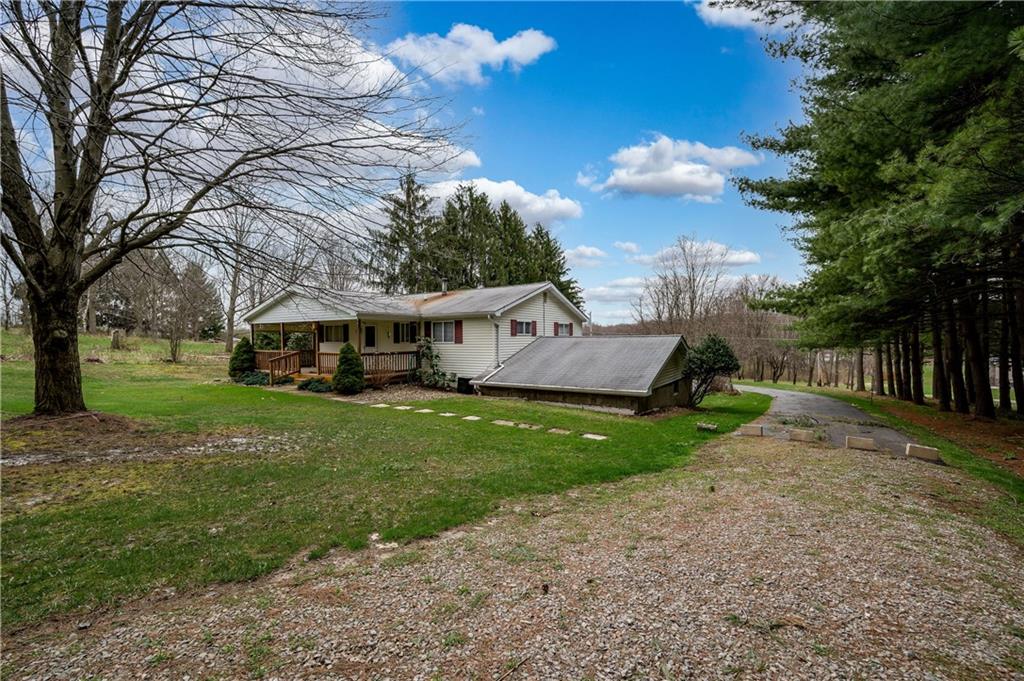 232 Pflugh Road Butler, PA 16001 - Photo 20 of 24 a view of a house with a yard