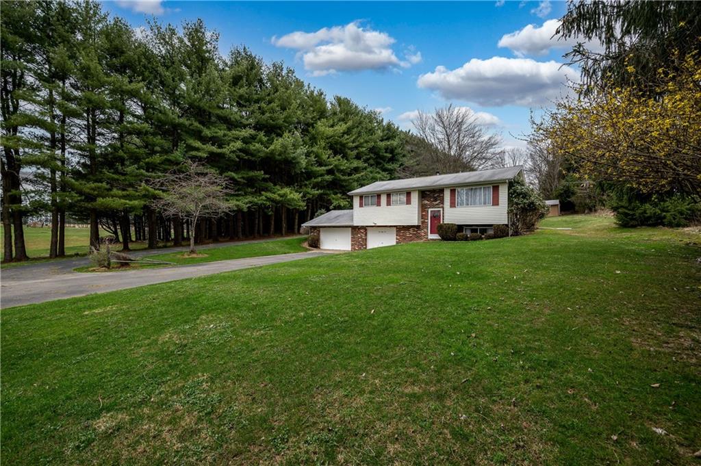 232 Pflugh Road Butler, PA 16001 - Photo 2 of 24 a view of a house with a big yard