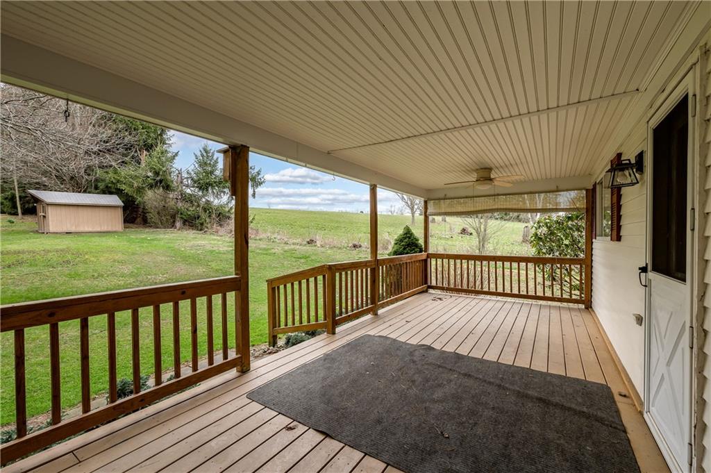232 Pflugh Road Butler, PA 16001 - Photo 22 of 24 a view of a porch with wooden floor of the house