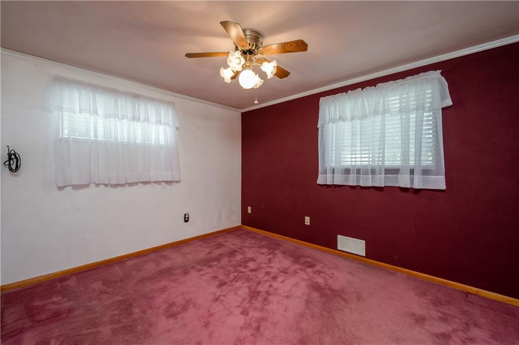 232 Pflugh Road Butler, PA 16001 - Photo 10 of 24 a view of an empty room with a window