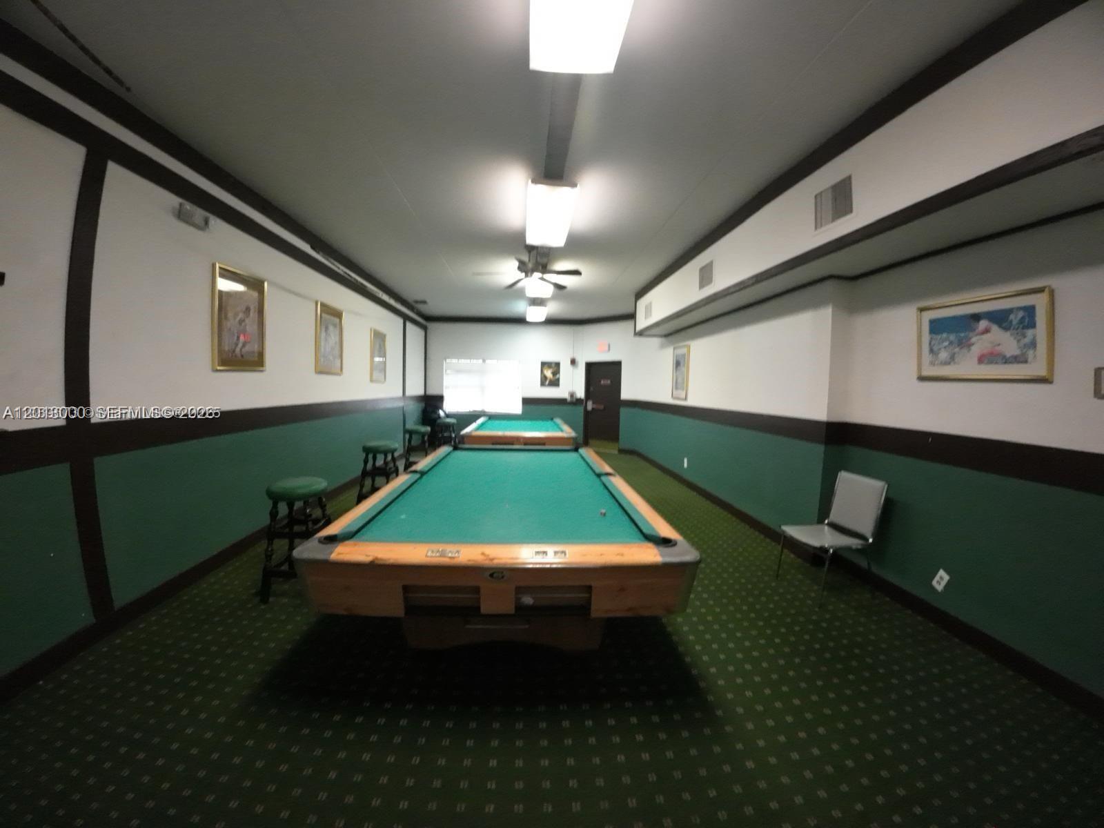 3730 Inverrary Drive, Unit 3B Lauderhill, FL 33319 - Photo 13 of 50 a room with pool table and windows
