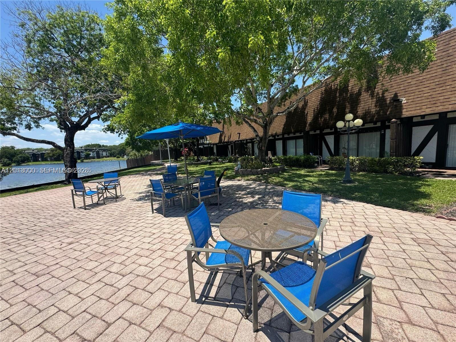 3730 Inverrary Drive, Unit 3B Lauderhill, FL 33319 - Photo 8 of 50 a view of outdoor space yard deck patio and outdoor seating