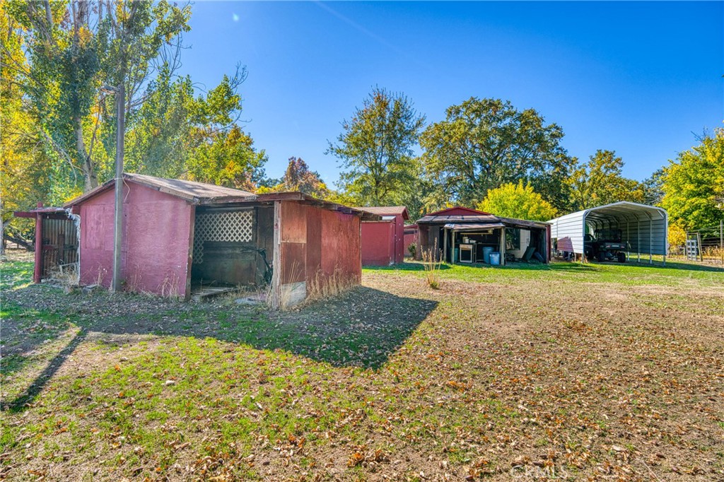11694 Old Spruce Grove Road Lower Lake, CA 95457 - Photo 21 of 55 a front view of a house with garden