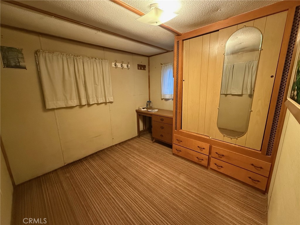 11694 Old Spruce Grove Road Lower Lake, CA 95457 - Photo 51 of 55 a view of front door with wooden floor