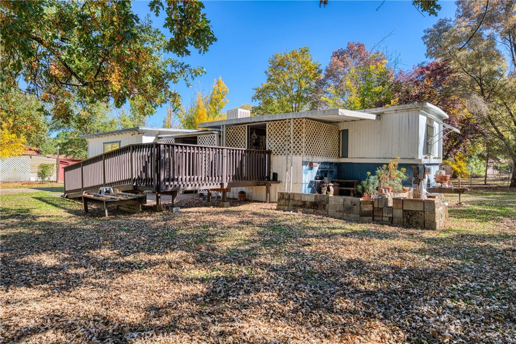 11694 Old Spruce Grove Road Lower Lake, CA 95457 - Photo 6 of 55 a view of a house with backyard and sitting area