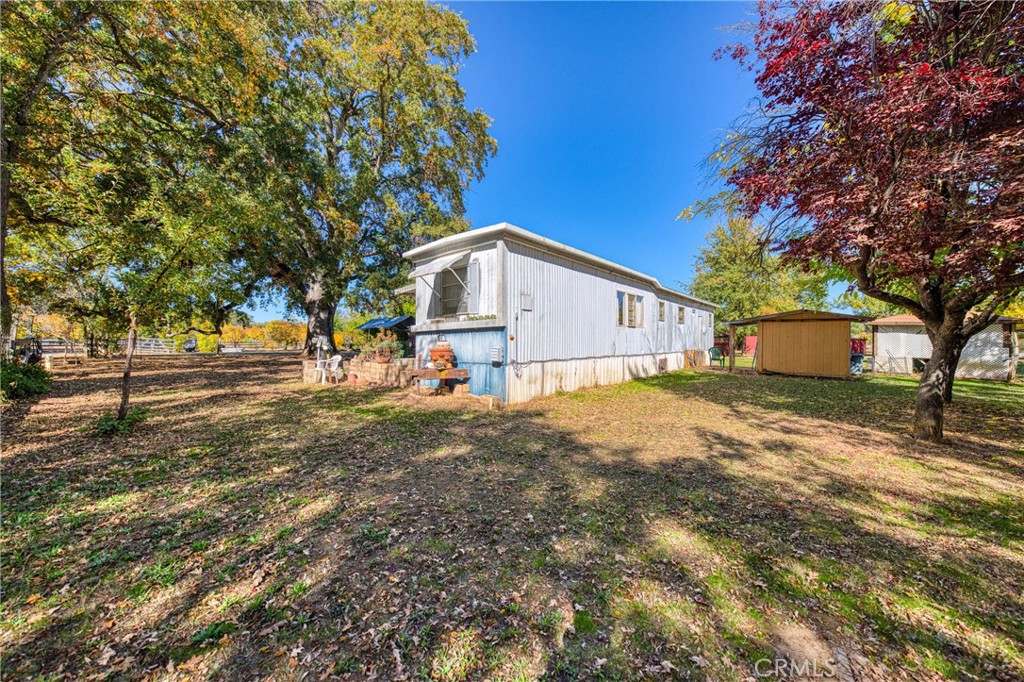 11694 Old Spruce Grove Road Lower Lake, CA 95457 - Photo 8 of 55 a view of a house with a yard