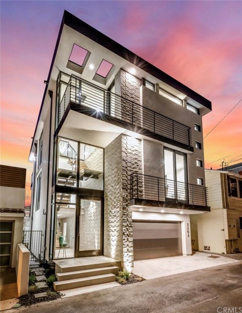 Spectacular views abound in this brand new construction located in the coveted sand section of Manhattan Beach