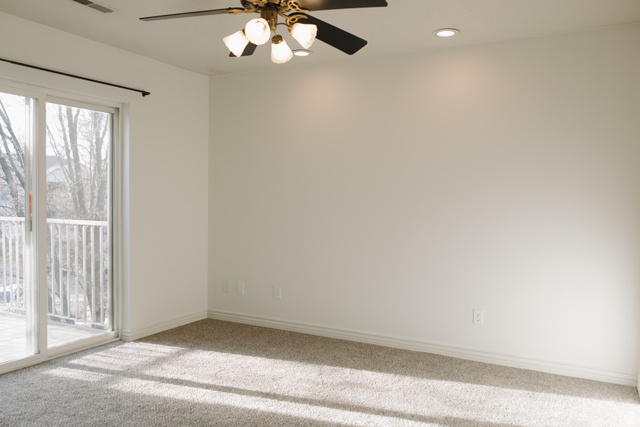 215 South 1050th West, Unit 10 Provo, UT 84601 - Photo 18 of 38 Unfurnished room with a ceiling fan, carpet floors, and recessed lighting