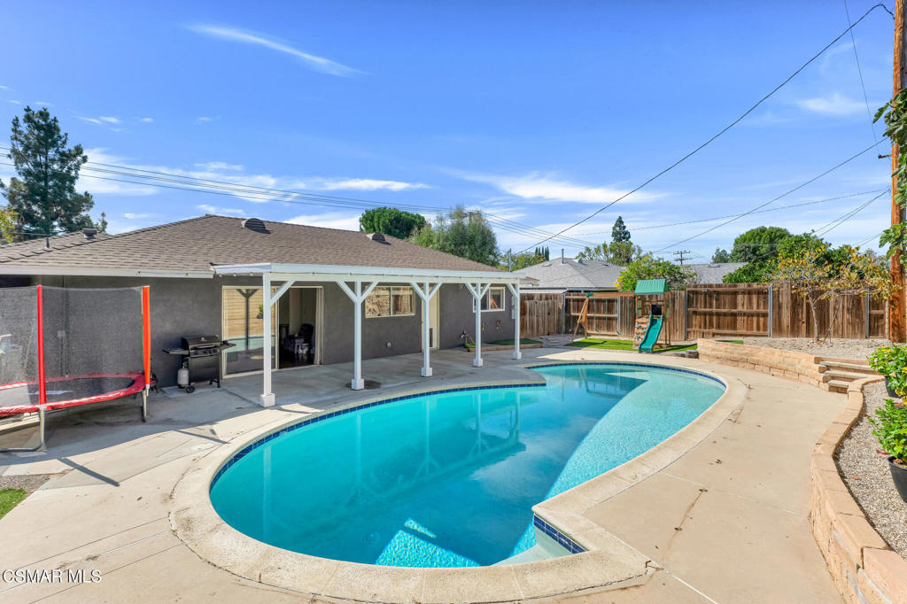 2141 Fitzgerald Road Simi Valley, CA 93065 - Photo 19 of 20 a view of a house with swimming pool