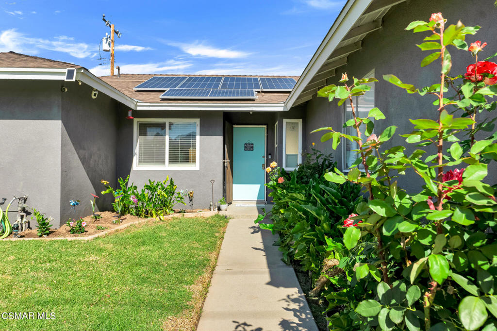 2141 Fitzgerald Road Simi Valley, CA 93065 - Photo 2 of 20 a front view of a house with a yard