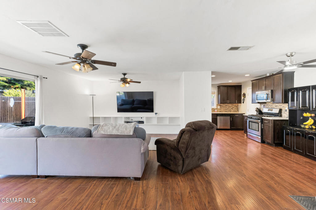 2141 Fitzgerald Road Simi Valley, CA 93065 - Photo 3 of 20 a living room with furniture and a flat screen tv