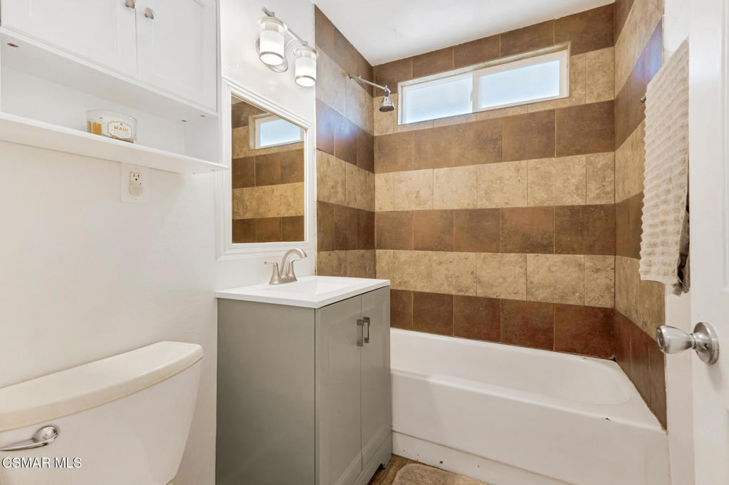 2141 Fitzgerald Road Simi Valley, CA 93065 - Photo 7 of 20 a bathroom with a sink a toilet and shower