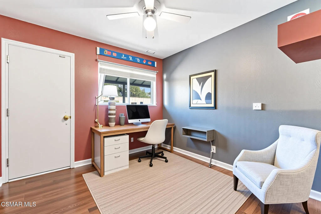 2141 Fitzgerald Road Simi Valley, CA 93065 - Photo 8 of 20 a workspace with wooden floor and a workspace
