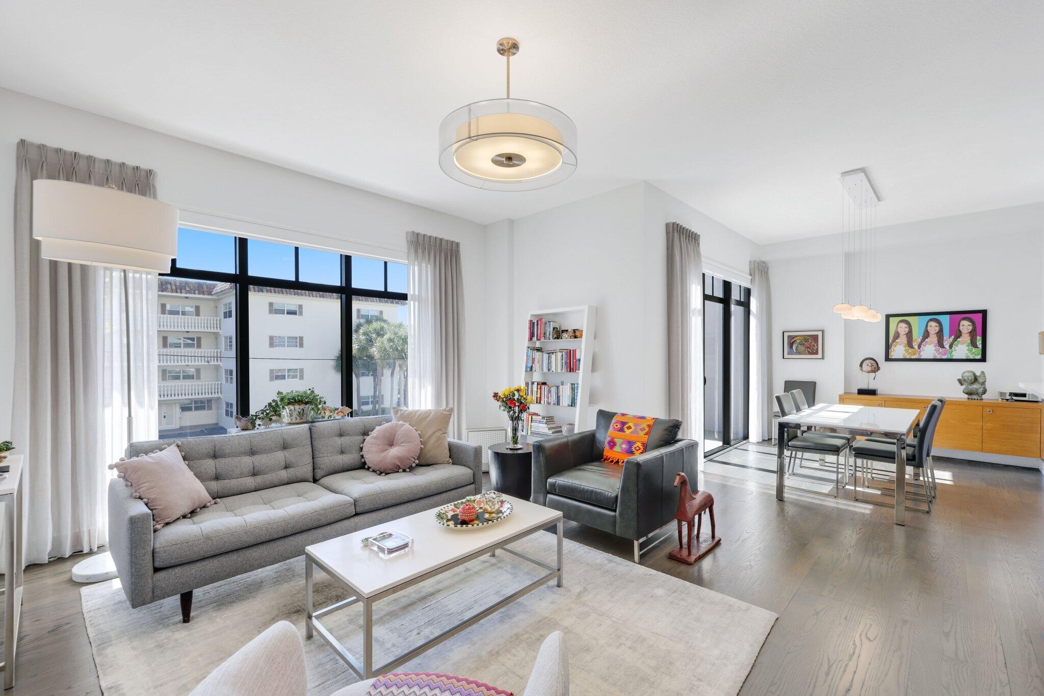 200 East Palmetto Park Road, Unit 7 Boca Raton, FL 33432 - Photo 1 of 58 a living room with furniture and a large window