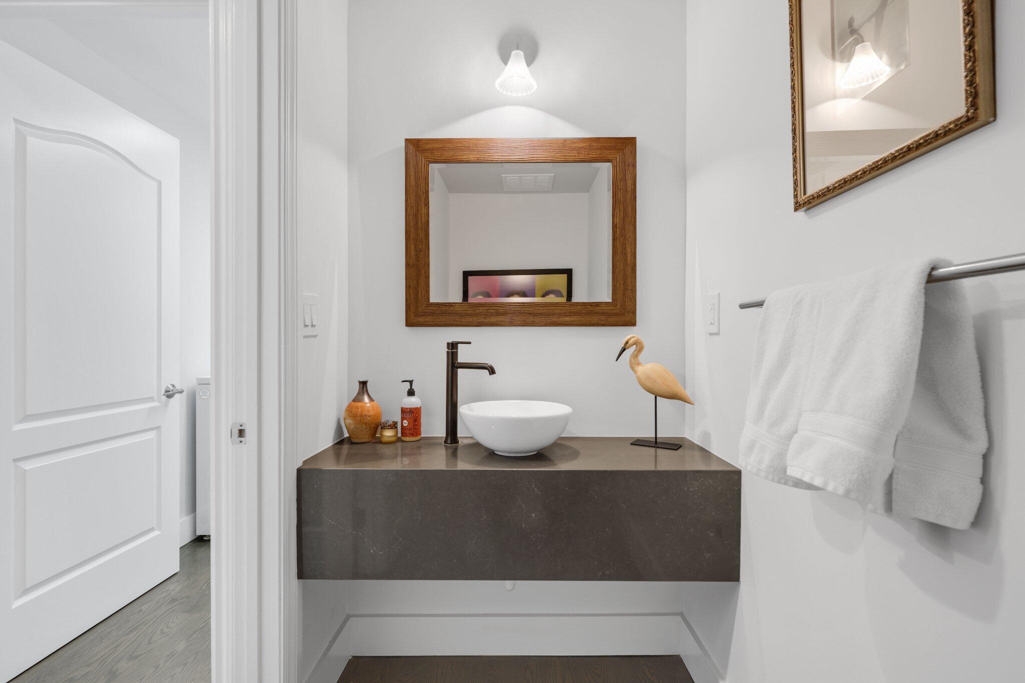 200 East Palmetto Park Road, Unit 7 Boca Raton, FL 33432 - Photo 18 of 58 a bathroom with a sink and a mirror