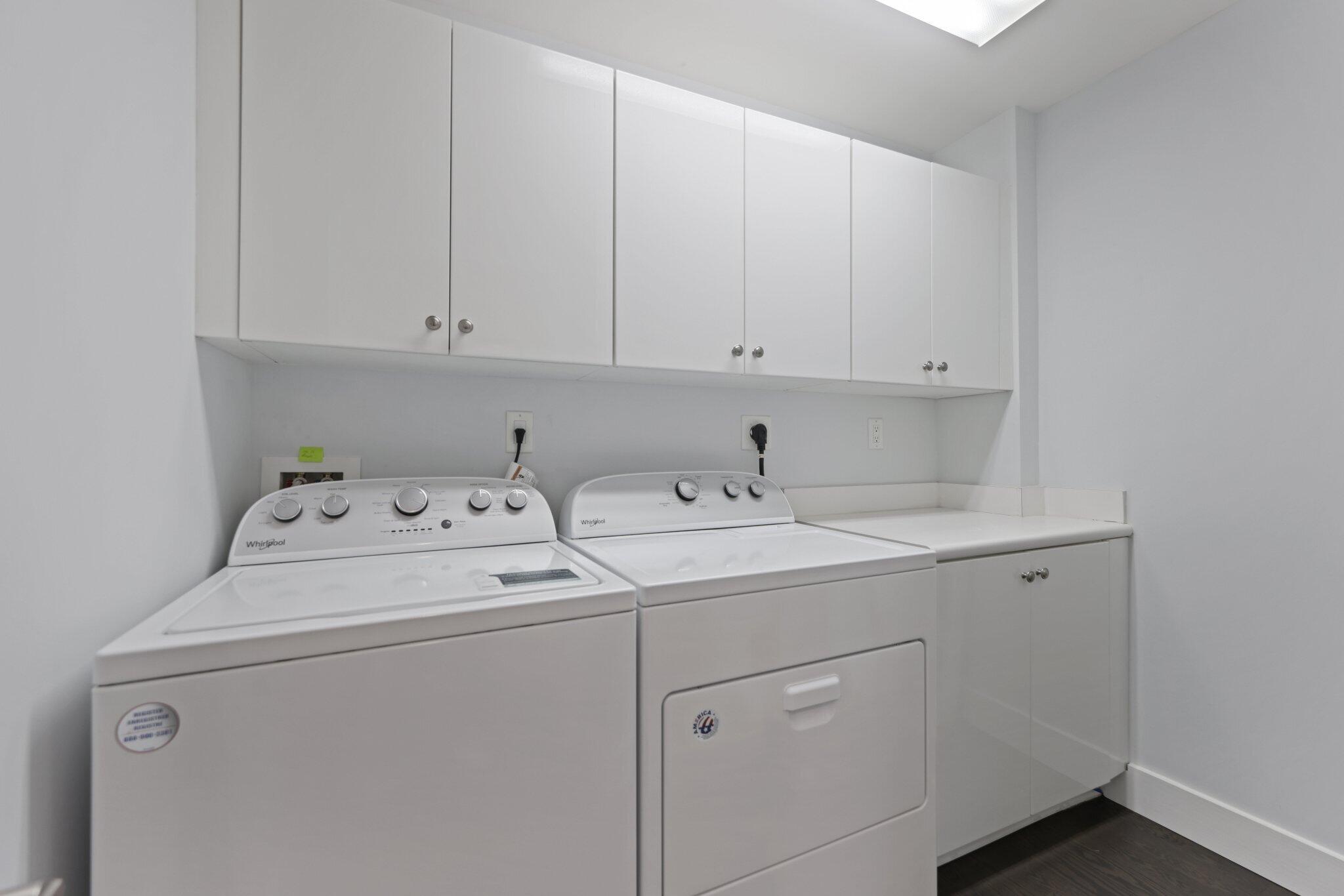 200 East Palmetto Park Road, Unit 7 Boca Raton, FL 33432 - Photo 19 of 58 a view of storage and utility room with washer and dryer