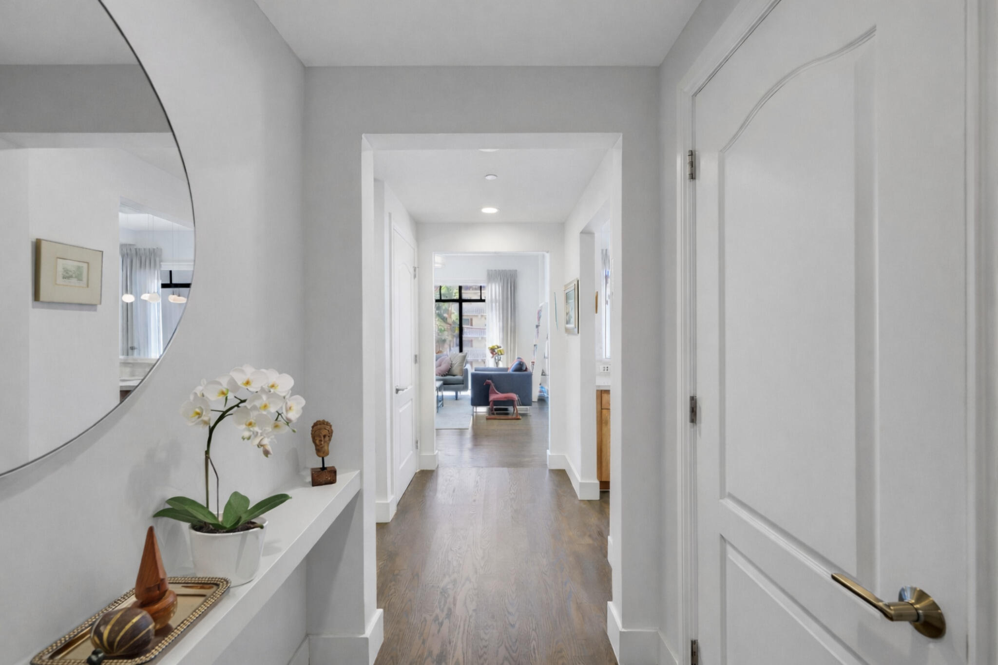 200 East Palmetto Park Road, Unit 7 Boca Raton, FL 33432 - Photo 2 of 58 a hallway with wooden floor and furniture
