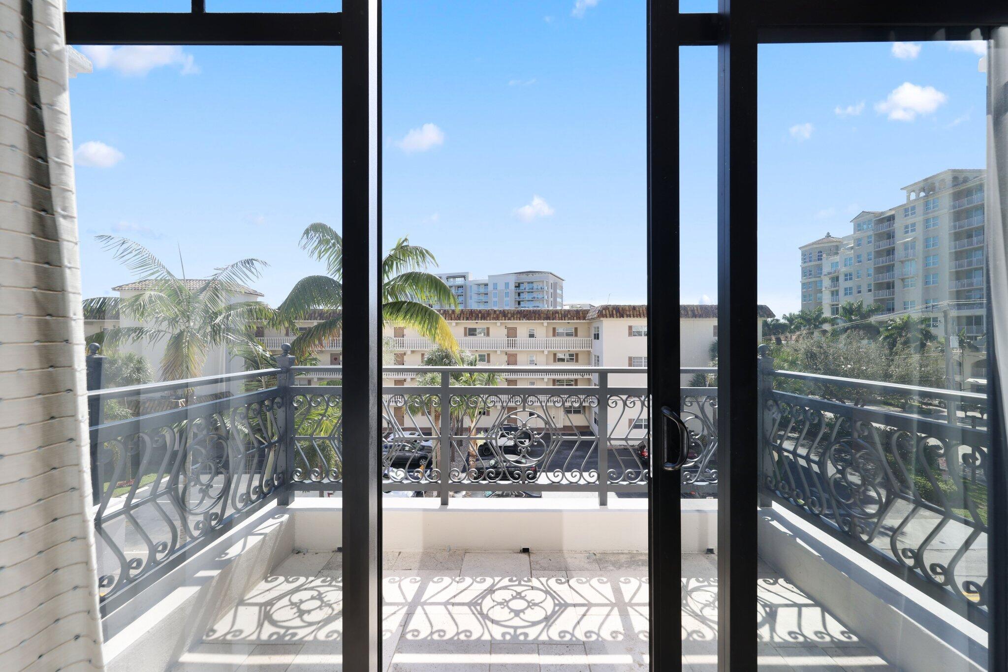 200 East Palmetto Park Road, Unit 7 Boca Raton, FL 33432 - Photo 28 of 58 a view of a city from a window