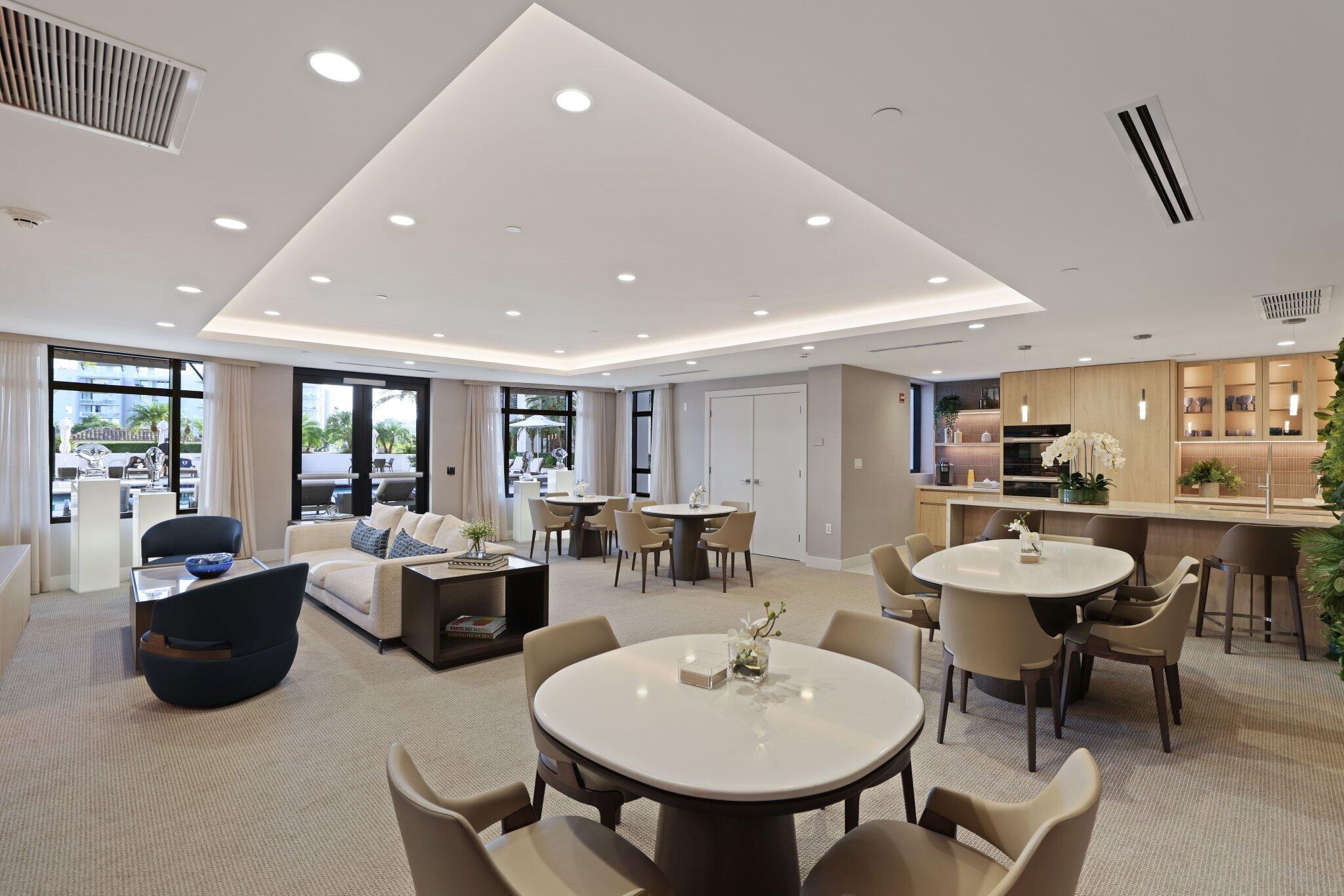 200 East Palmetto Park Road, Unit 7 Boca Raton, FL 33432 - Photo 53 of 58 a view of a dining room with furniture and chandelier
