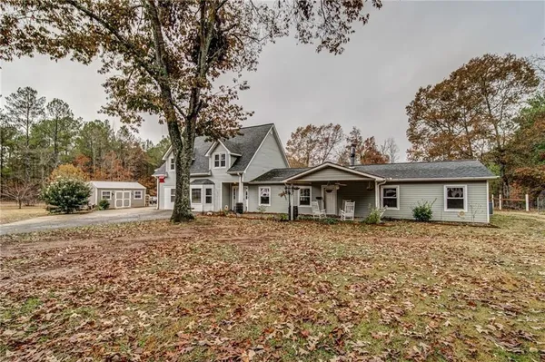 front view of a house with a yard