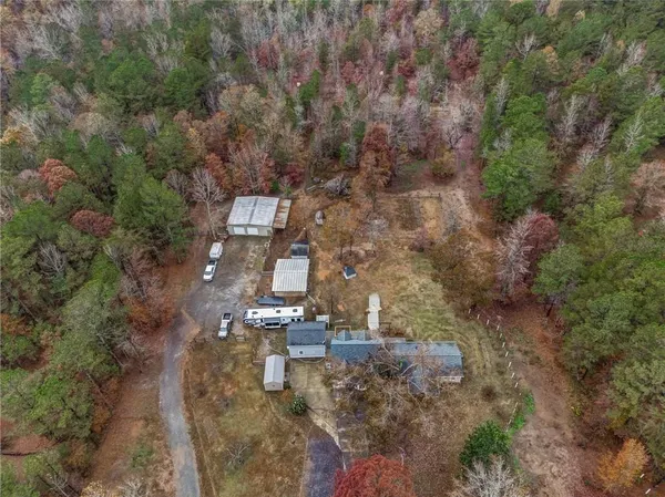 an aerial view of residential house with outdoor space