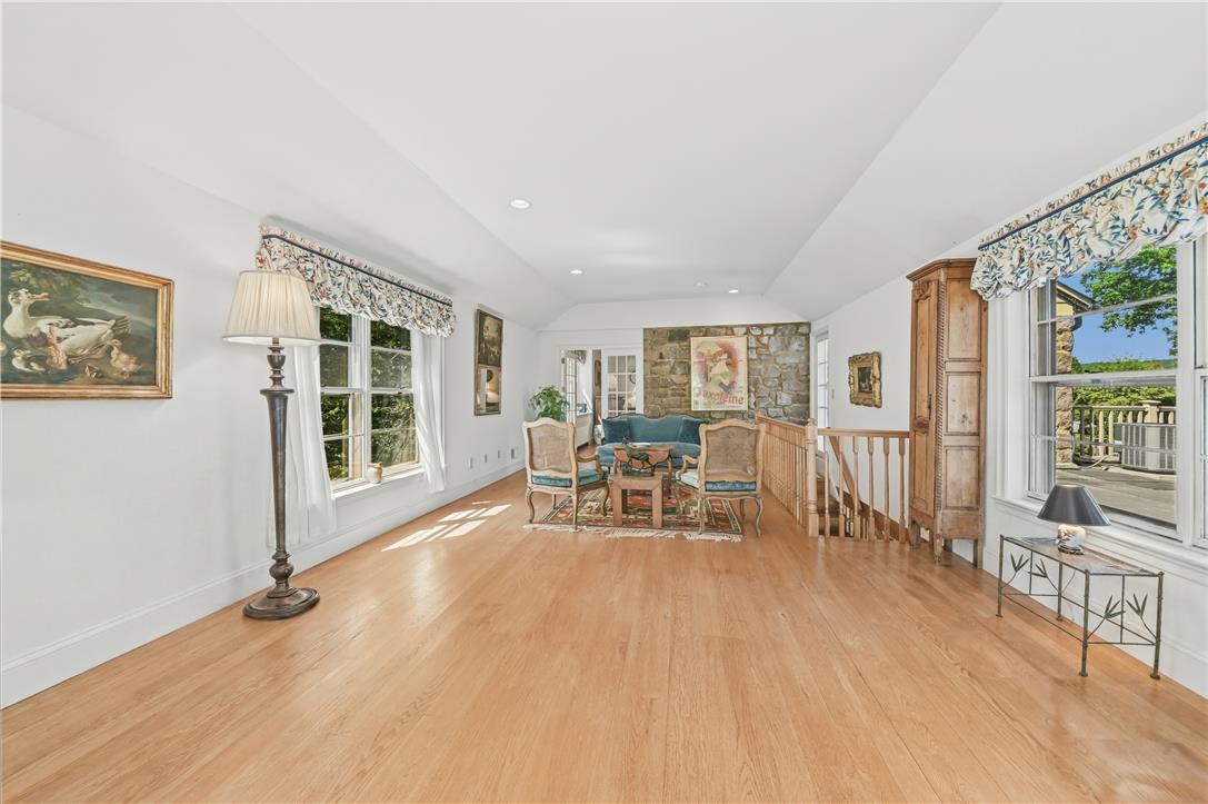 1194 Street Road Buckingham, PA 18938 - Photo 28 of 56 a living room with furniture and a table with wooden floor