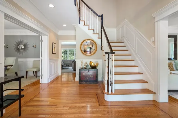 a view of entryway with wooden floor
